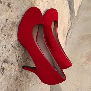 Women’s red high heeled shoes size 8